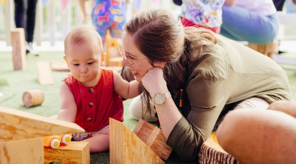 Parents playing with baby