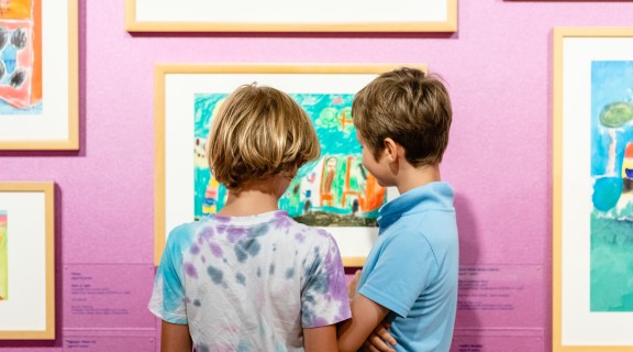 Children in an art exhibition.