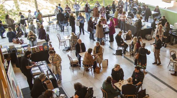 Teachers network on Queensland Terrace at 2025 Curriculum Connect Symposium