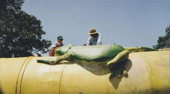 Big Dreamers filmmaker Camille Hardman films as artist Brian Newell paints the Big Golden Gumboot.
