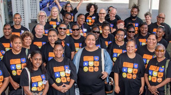 Participants of the 2024 IKC Workshop wearing Digital and You branded t-shirts.