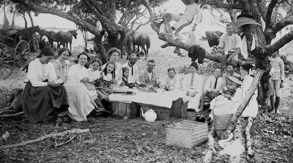 Black and white image of a family picnic in the Queensland bush in early 1900s.
