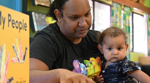 Adult reading with child