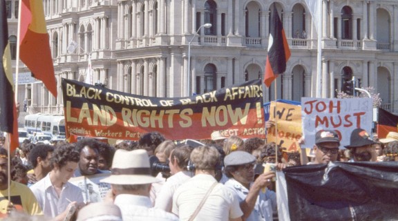 Protesters near Brisbane’s iconic casino. Image courtesy of Uniikup Productions Ltd.
