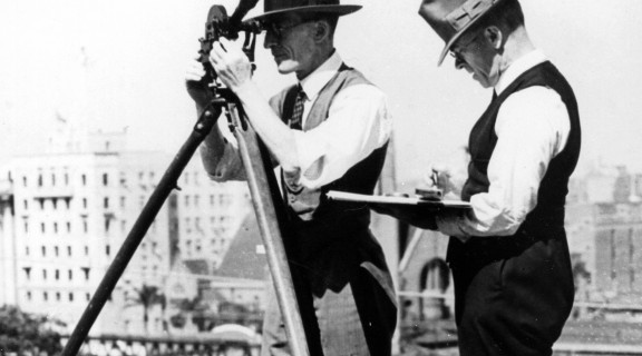 Two meteorologists registering information using their recording equipment, ca.1937