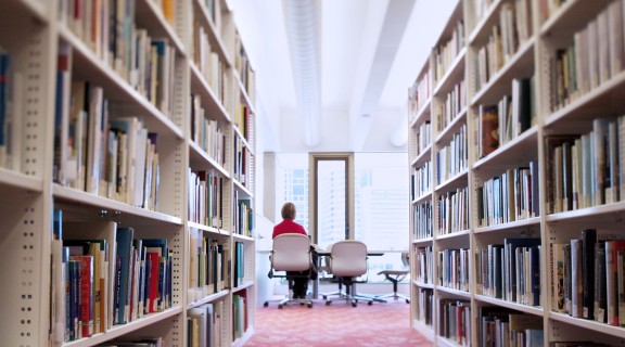 Client reading in the State Library of Queensland.