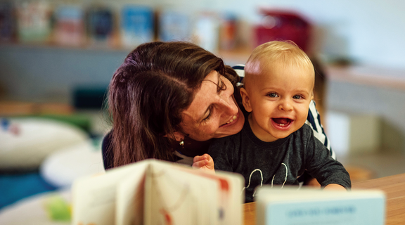 Mum and baby reading