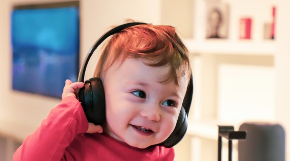 Young boy wearing headphones