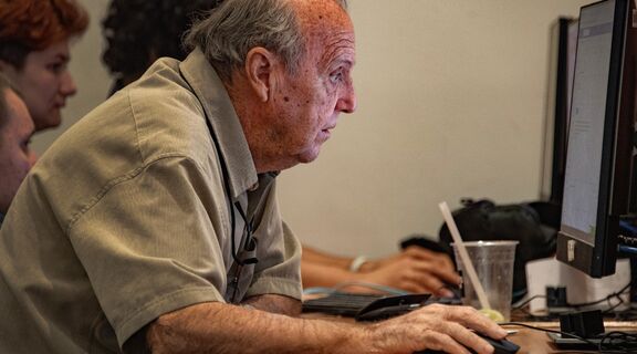 Older person using a computer at Cairns Public Library
