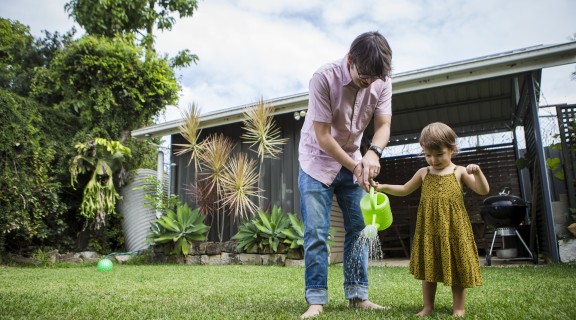 Caregiver and child in the garden