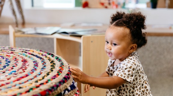 Toddler exploring an interior
