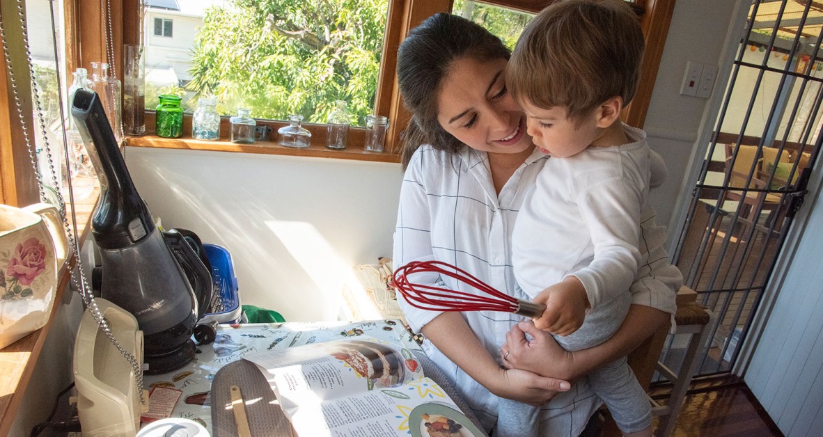 Woman and son reading a recipe together