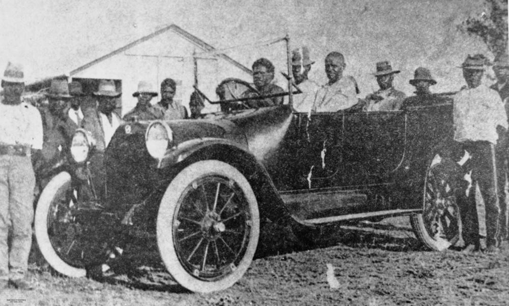 Jerry Jerome driving his car with friends, Taroom Settlement, 1925,  Negative number 108905, John Oxley Library, State Library of Queensland