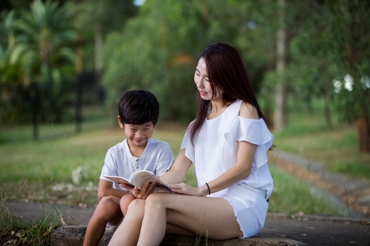 Mother and child enjoy reading together