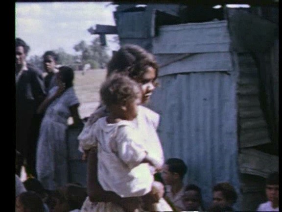 My Grandma Joanie West with her Baby, at Church at Goodooga Tin Camp in 1963.