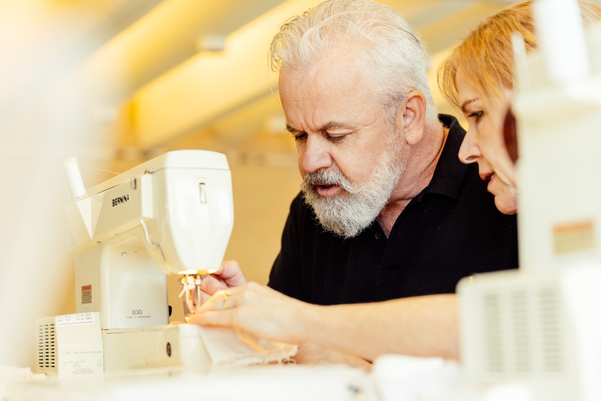 Mark uses the sewing machine