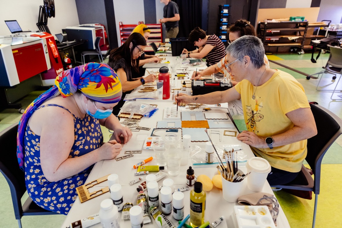 Workshop participants making Qld architecture miniatures
