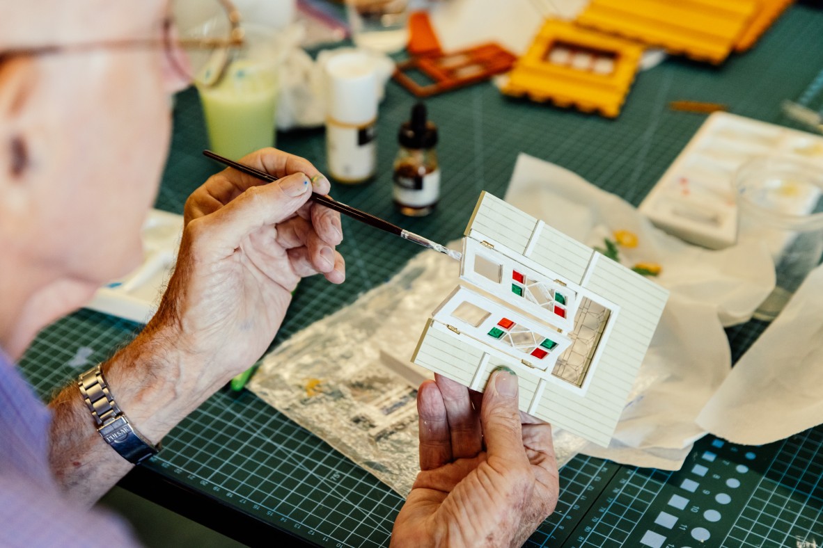 A photo of Queensland miniature swing doors being painted