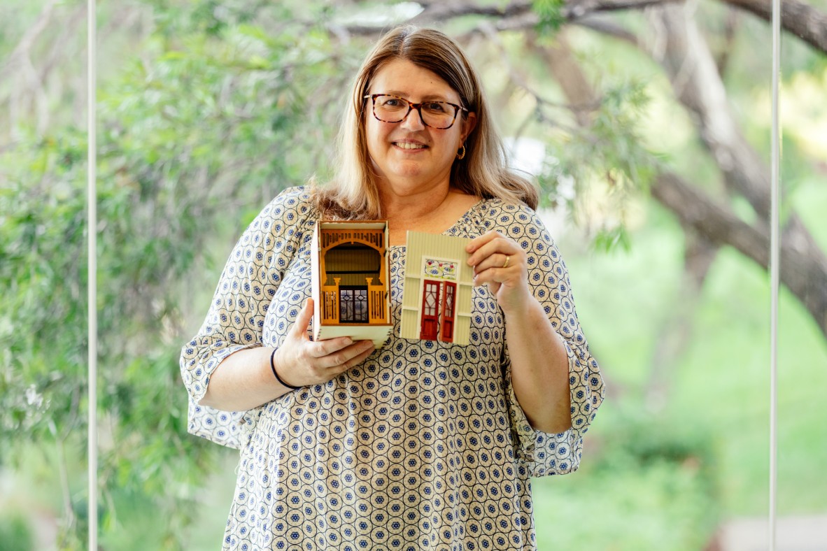 A photo of one of the Queensland architecture in miniature workshop participants with their book nook