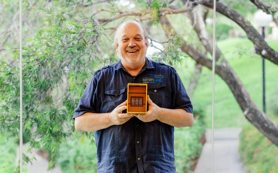 A photo of one of the Queensland architecture in miniature workshop participants with their book nook