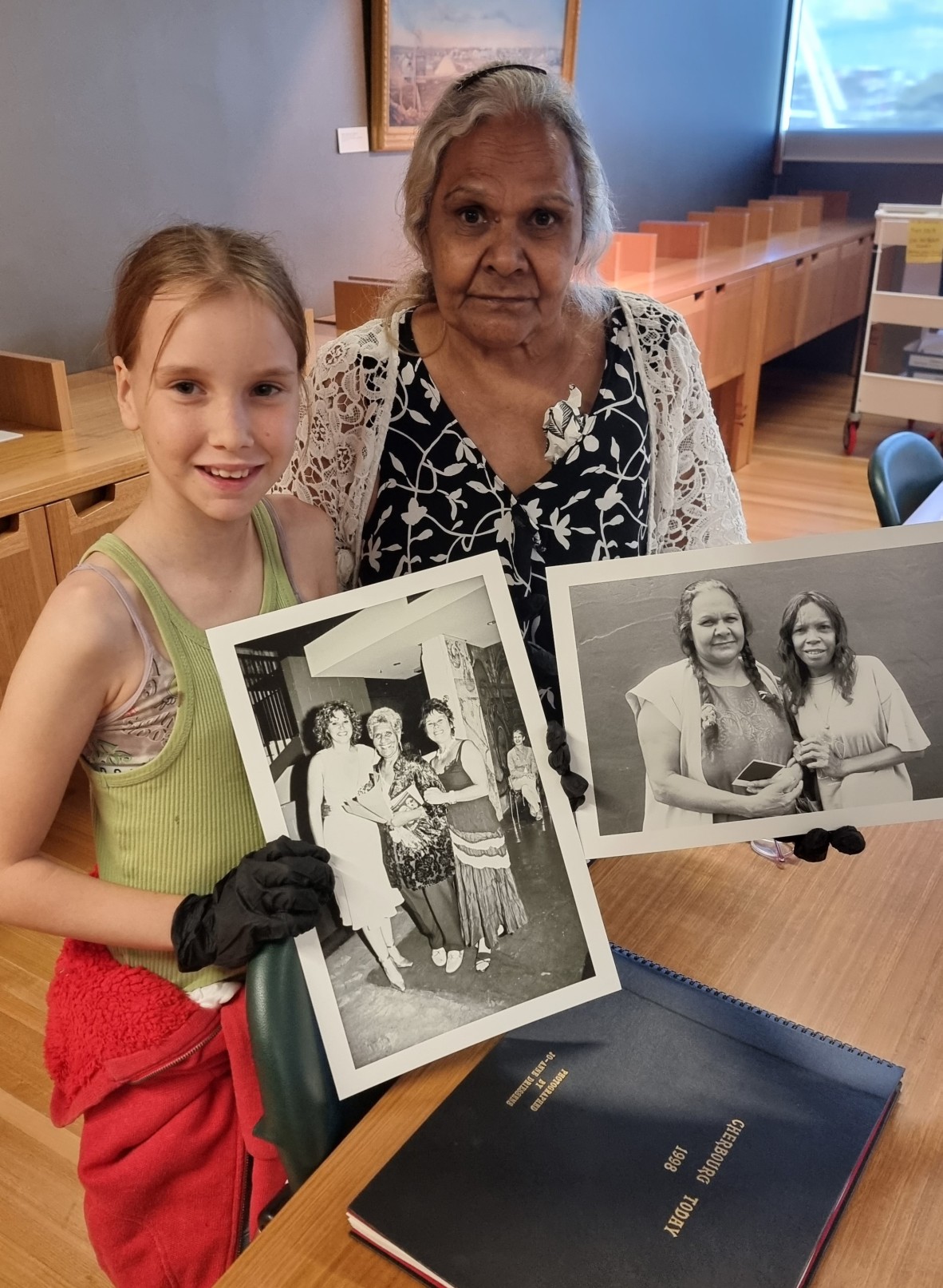 One of Jo's photography subjects revisiting a photograph taken of her with her Granddaughter. 