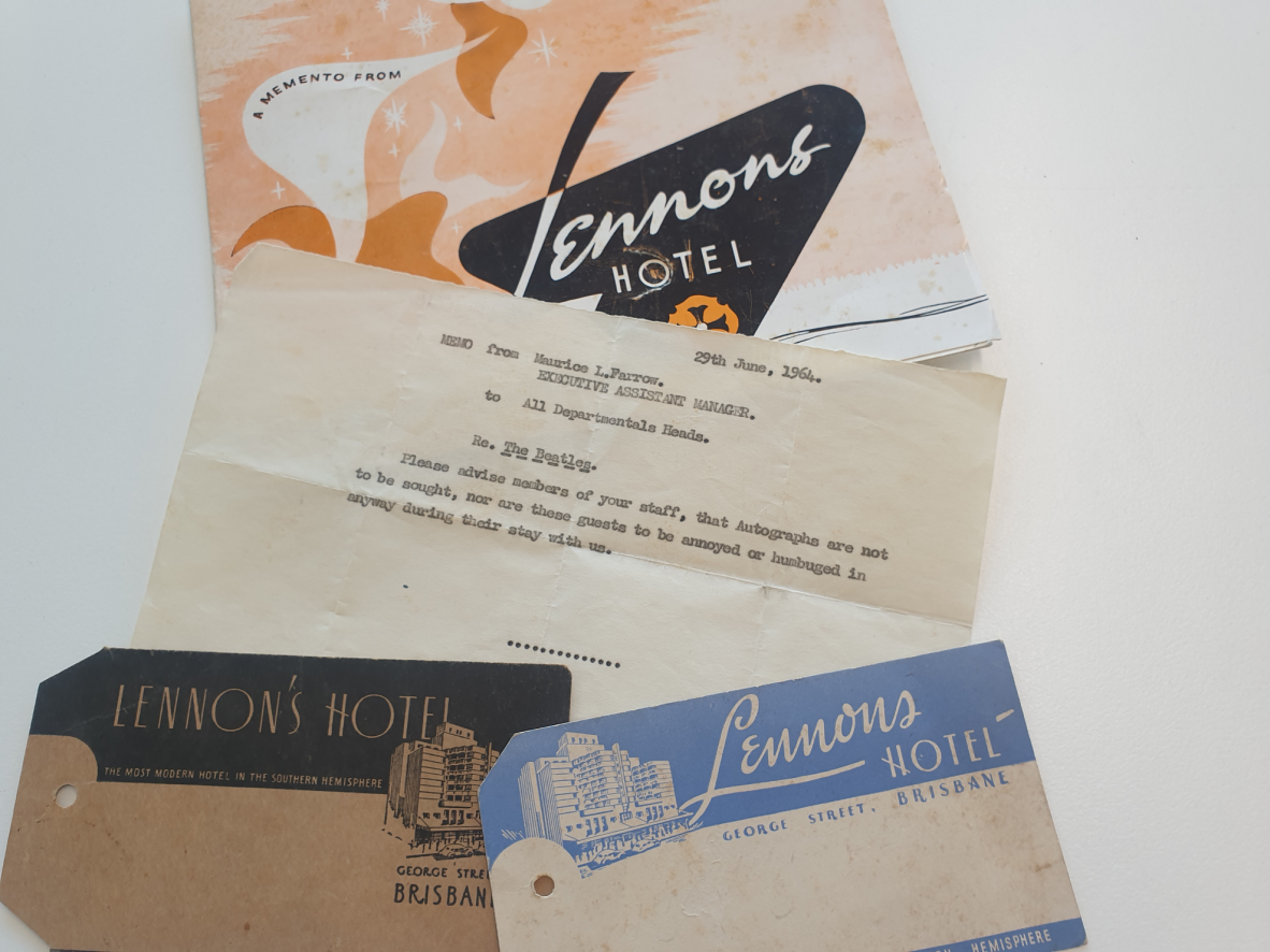 Typewritten memo surrounded by advertisements for Lennons Hotel