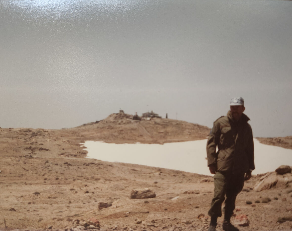 Joe Cazey at the summit of Mt Hermon