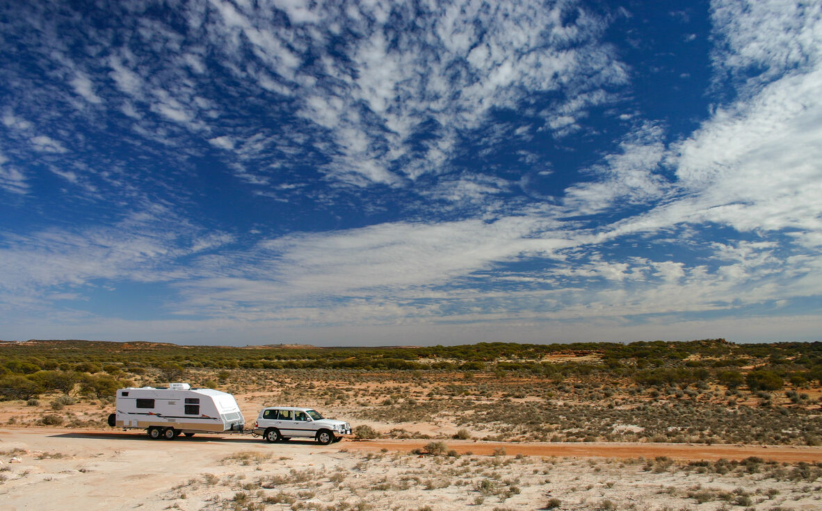 car towing caravan in outback Australia