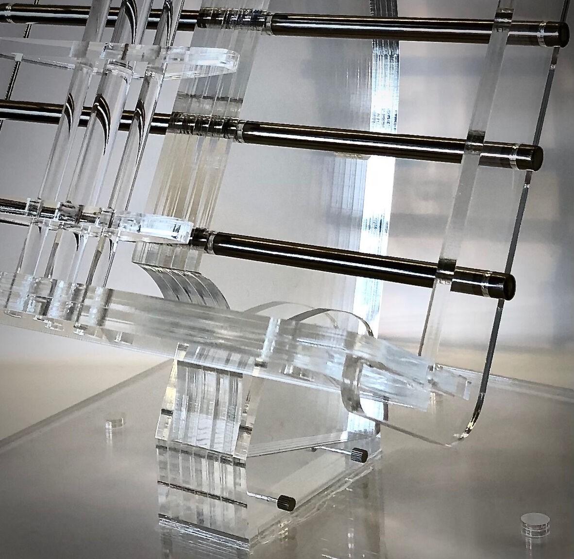 Acrylic and stainless steel book holder designed by Open Lab regular, Tom, 2025.