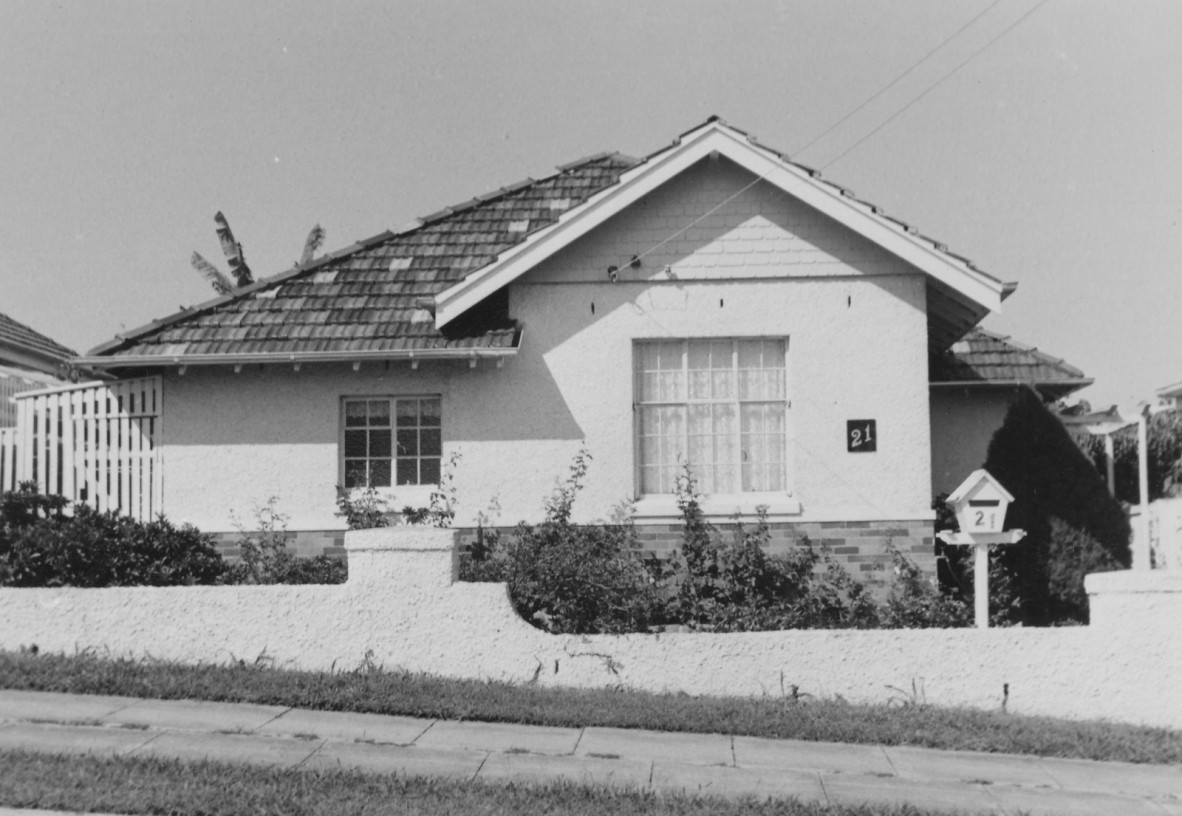 Black and white photo of single level house in Newmarket.