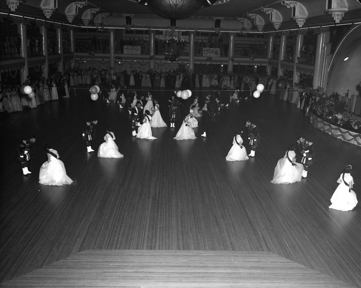 Dances and spectators at a Debutante Ball held at Cloudland Ballroom in Brisbane.