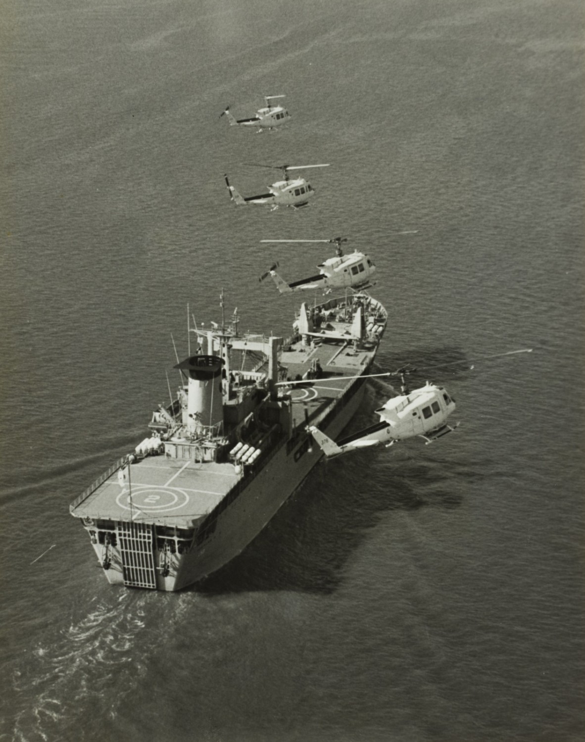  RAAF Iroquois helicopters preparing to land on HMAS Tobruk Moreton Bay 1982