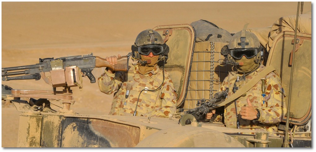 Soldiers manning a Bushmaster armoured vehicle Afghanistan 2009