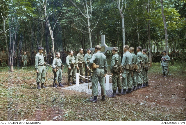 Long Tan, South Vietnam. 18 August 1969. A poignant moment at the commemorative service held on the site of the battle of Long Tan, fought in 1966 by D Company, 6th Battalion, The Royal Australian Regiment (6 RAR). 