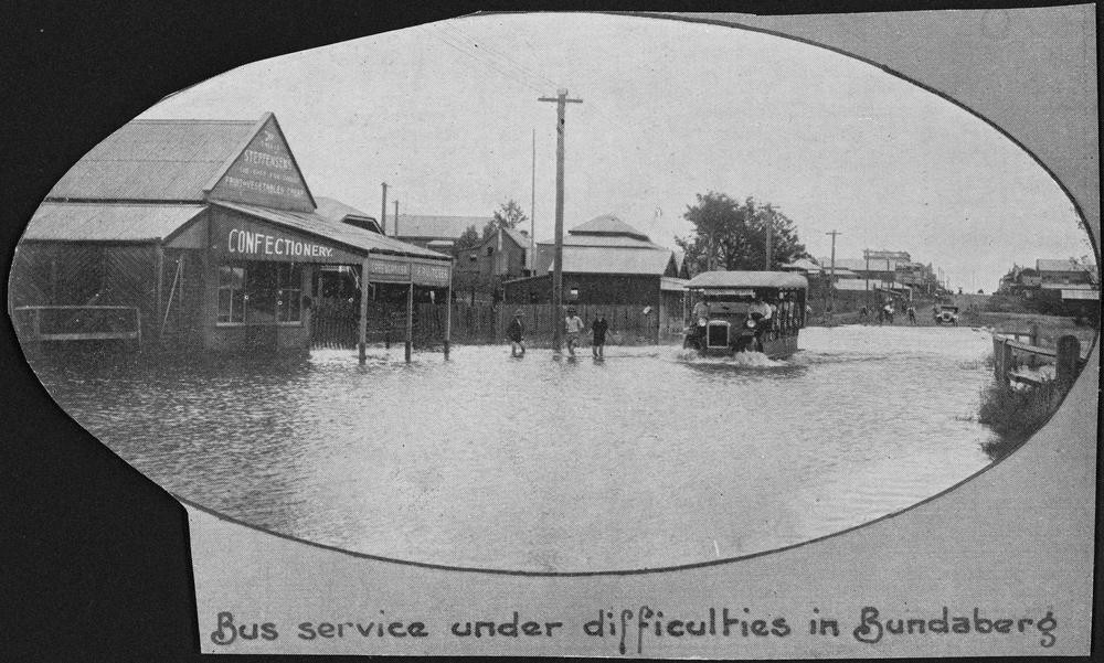 Bus travelling through a flooded street in Bundaberg 1928