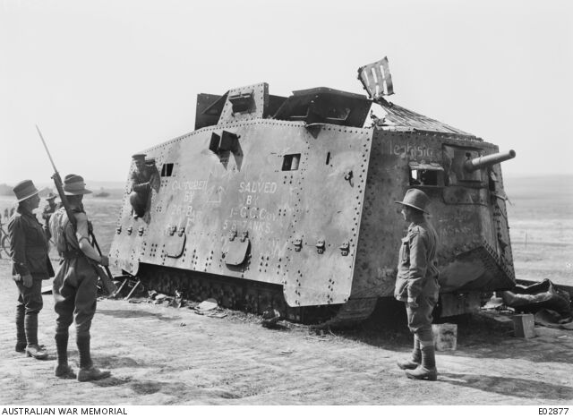 Troops beside the damaged tank Mephisto