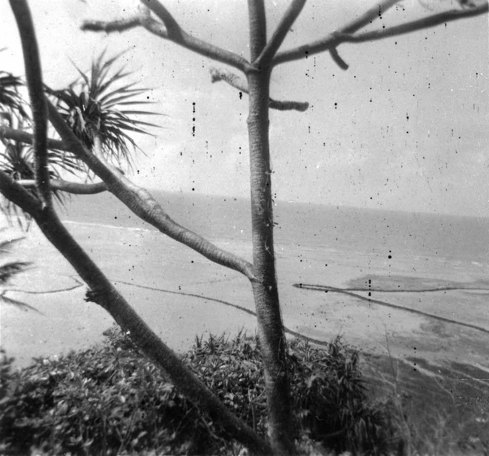 Distant view of fish traps off Murray Island, 1957