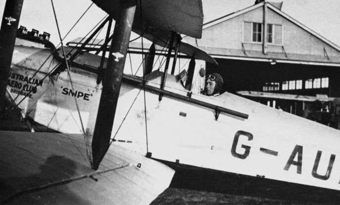 A small plane with a pilot getting ready for take off
