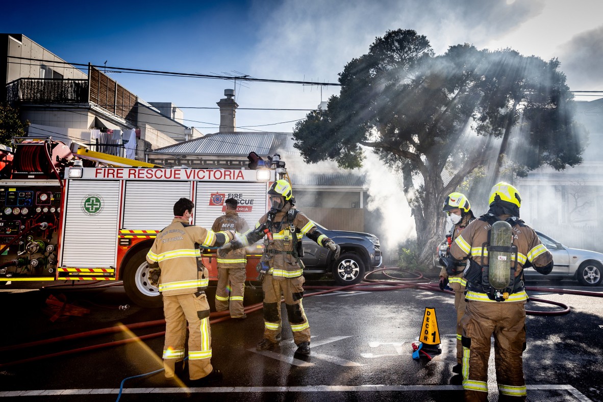 A photo of firefighters attending a house fire