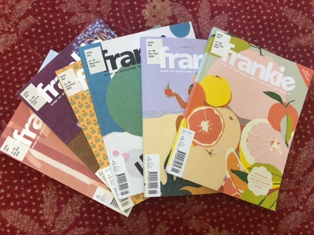 Photo of six Frankie magazines fanned out on carpet