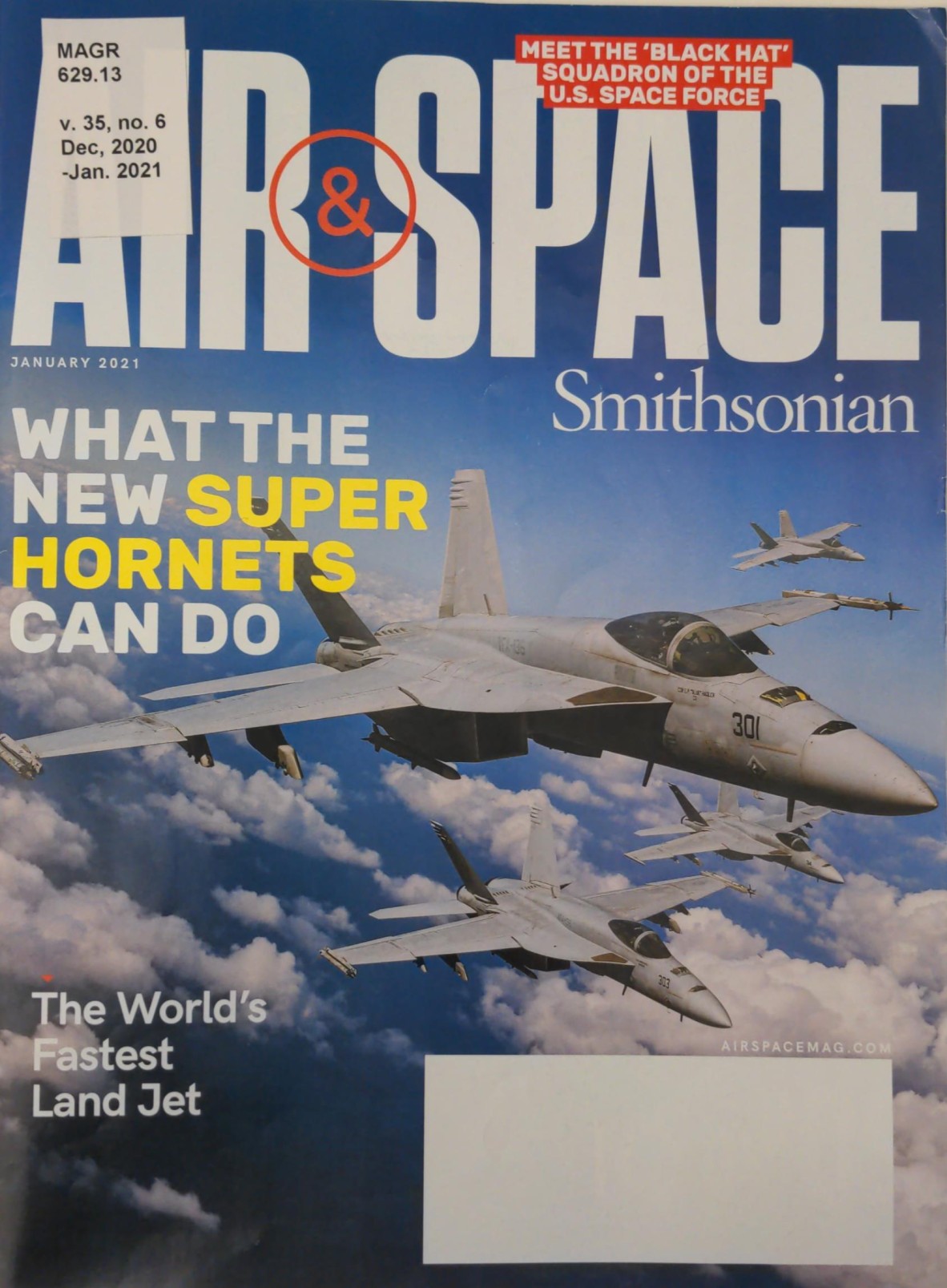 Image of four Super Hornets on the front cover of the "Air & Space Smithsonian" magazine January 2021