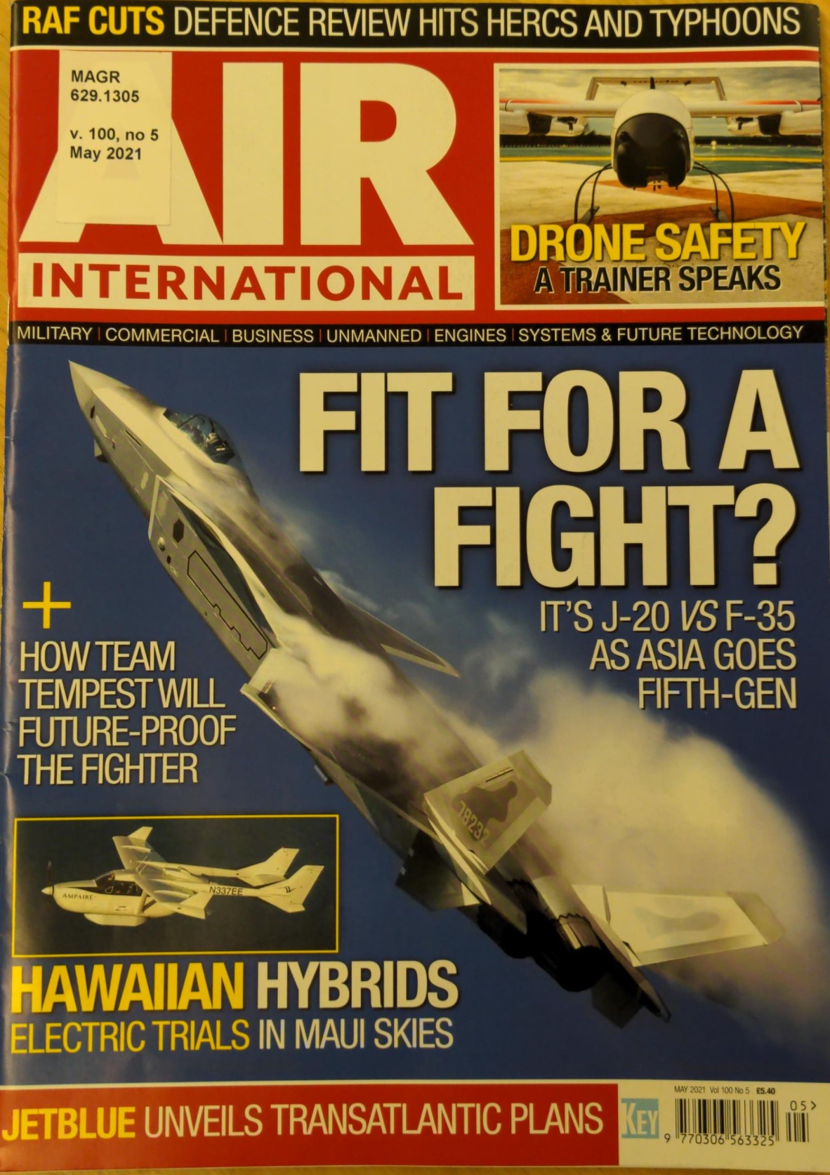 Image of a fighter jet (J-20 VS F-35) on front cover of "Air International" magazine May 2021