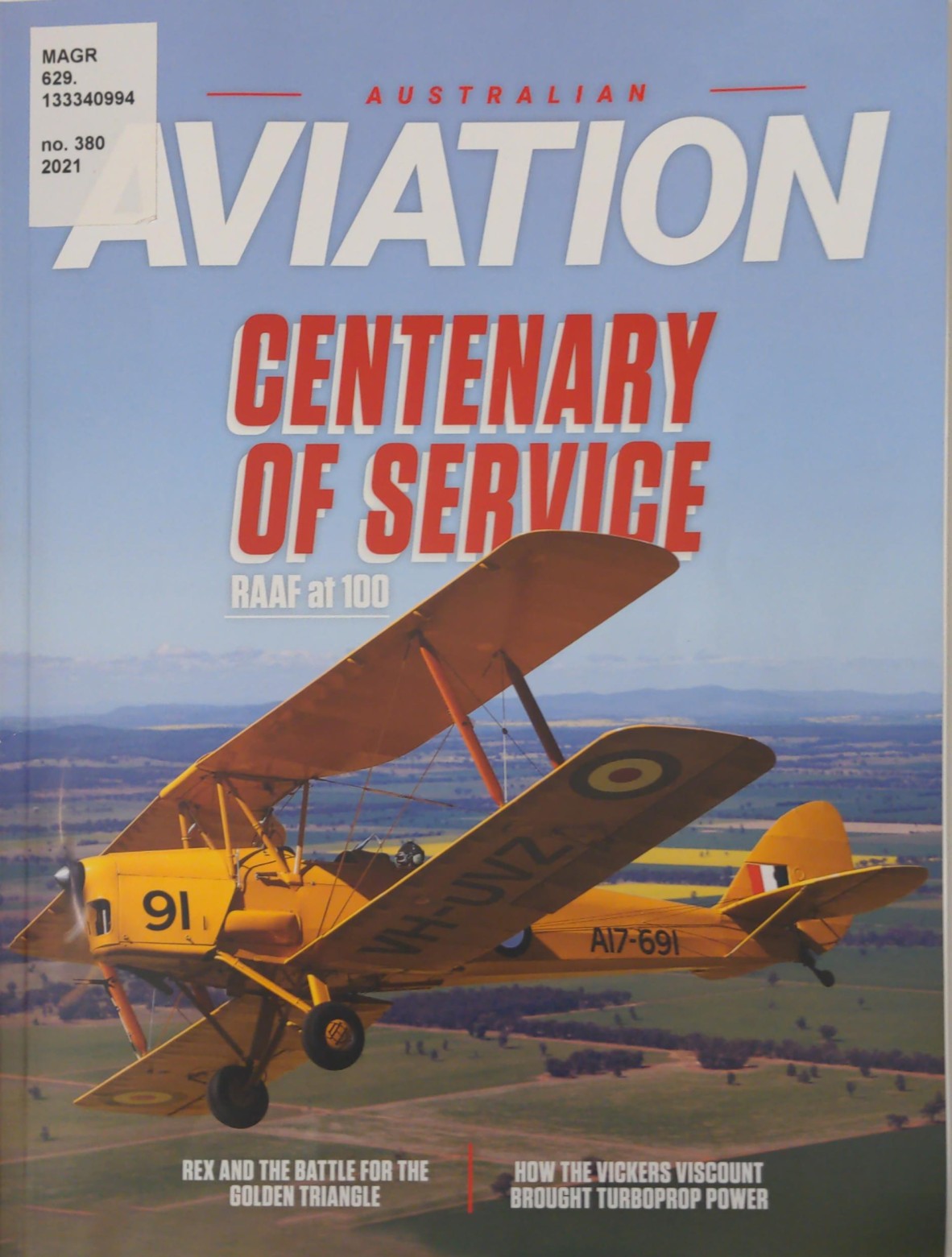 Image of a yellow Tiger Moth A17-691 on front cover of Australian Aviation magazine issue no 380 2021