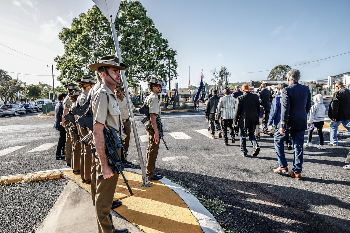 Active servicemen and women respectfully observing the local people marching on Anzac Day in Cherbourg in 2023.
