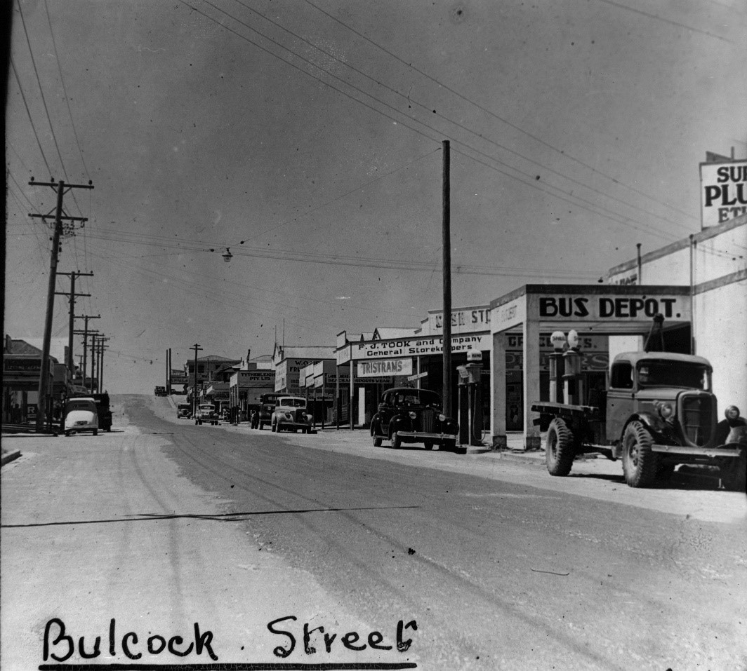 An empty and sun flooded Bulcock Street in 1946.