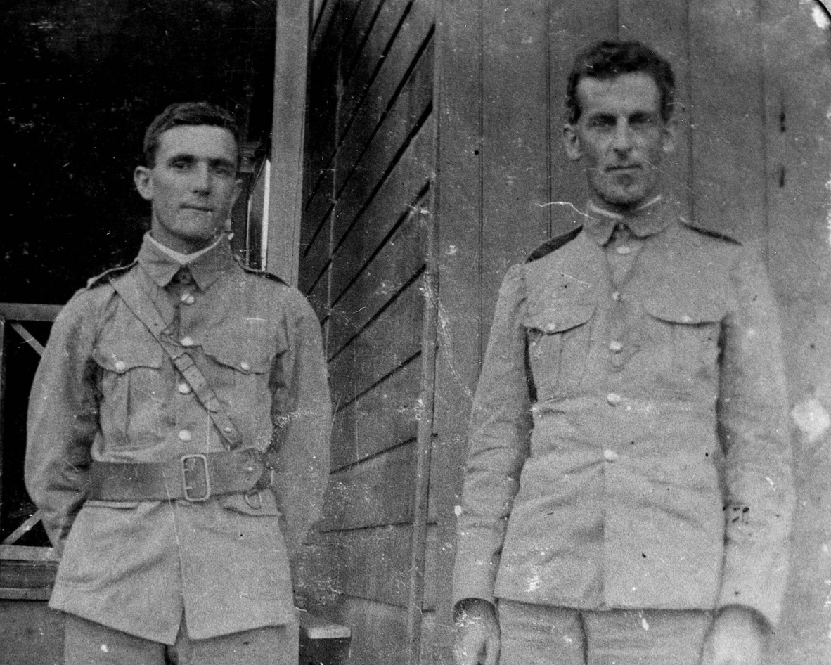 Black and white photograph of two cadet officers, dressed in uniform, at the Southport School in 1907.
