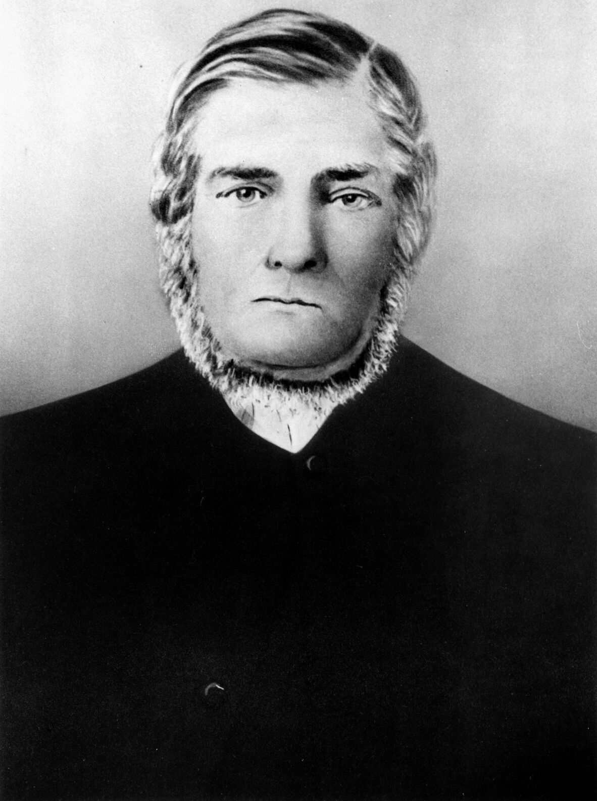 Black and white image of 1800s man with neck beard