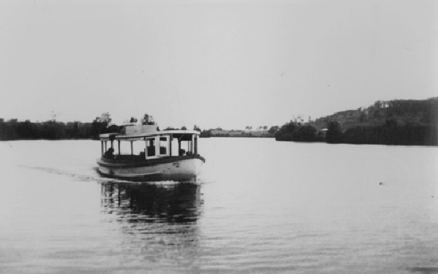 Black and white photo of Yandina mail boat, "Ariel", on the Maroochy River, ca. 1954