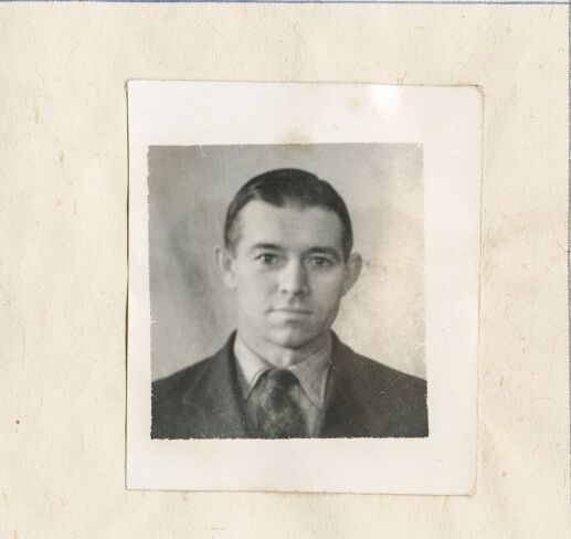 Studio portrait of Charles Williams in his wartime scrapbook.