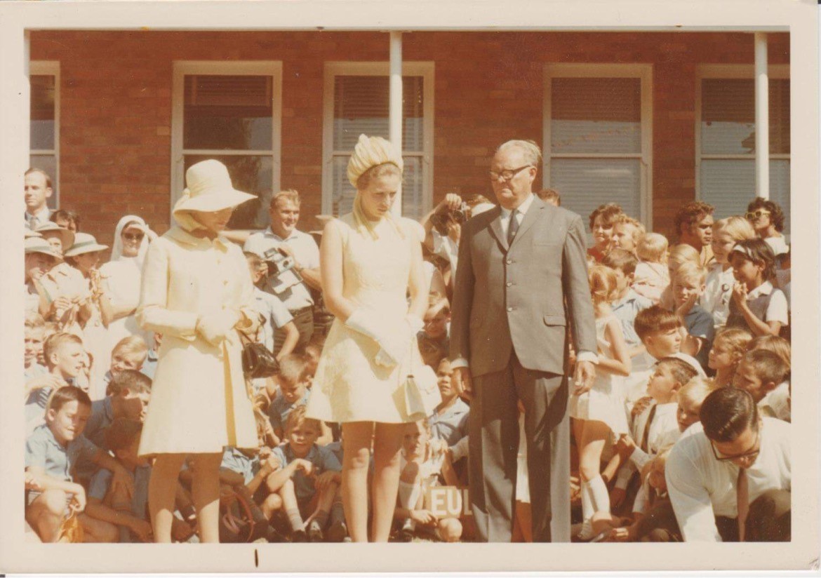 Cr. Jack Tonkin and wife Alma observe Princess Anne plant a Yapunyah tree outside the Civic Centre, Cunnamulla, 16 April 1970.
